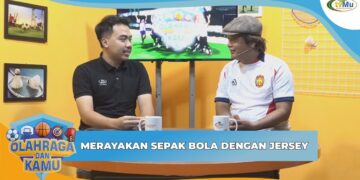 MERAYAKAN SEPAK BOLA DENGAN JERSEY